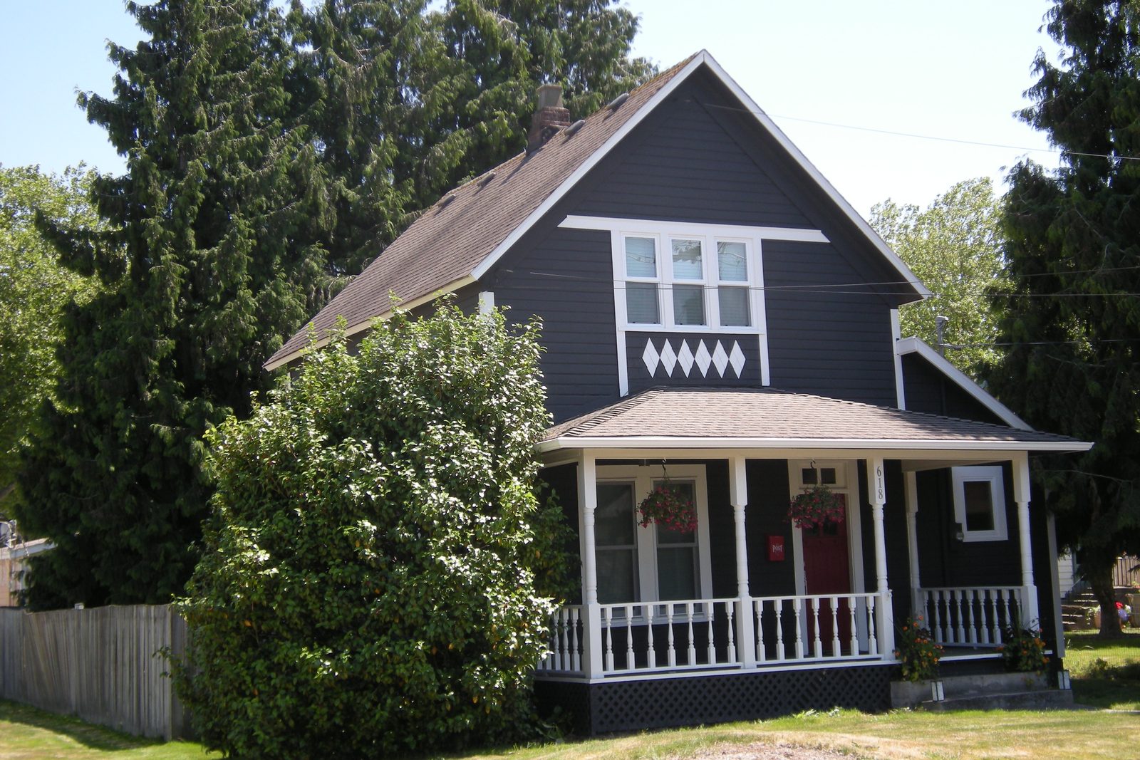 Restored two-story home with a wraparound front porch at 618 Smithers Avenue S in the South Renton neighborhood