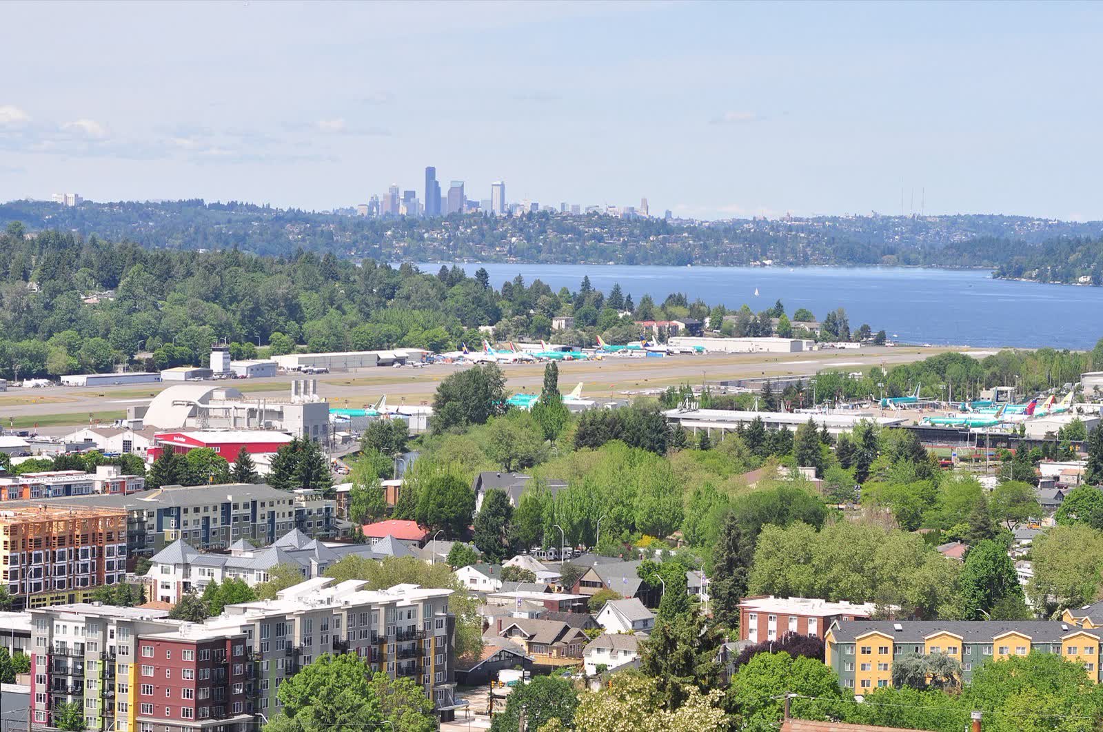 View from Renton Hill over downtown Renton and Renton Municipal Airport to Lake Washington, with the Seattle skyline in the distance